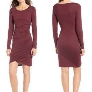 Leigh ruched body con long sleeved dress in extra small, very flattering.